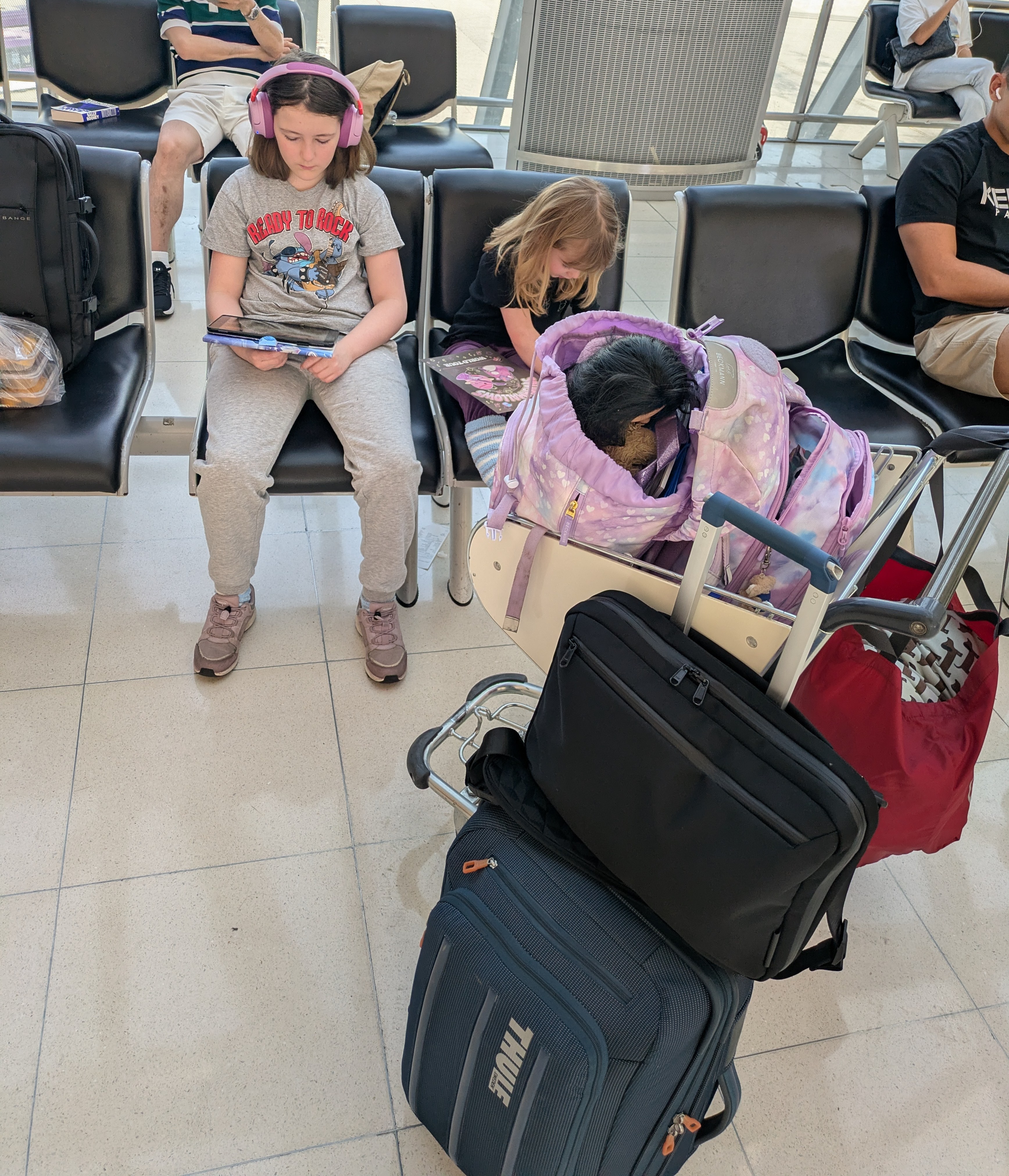 Kids are now experts at waiting in airports